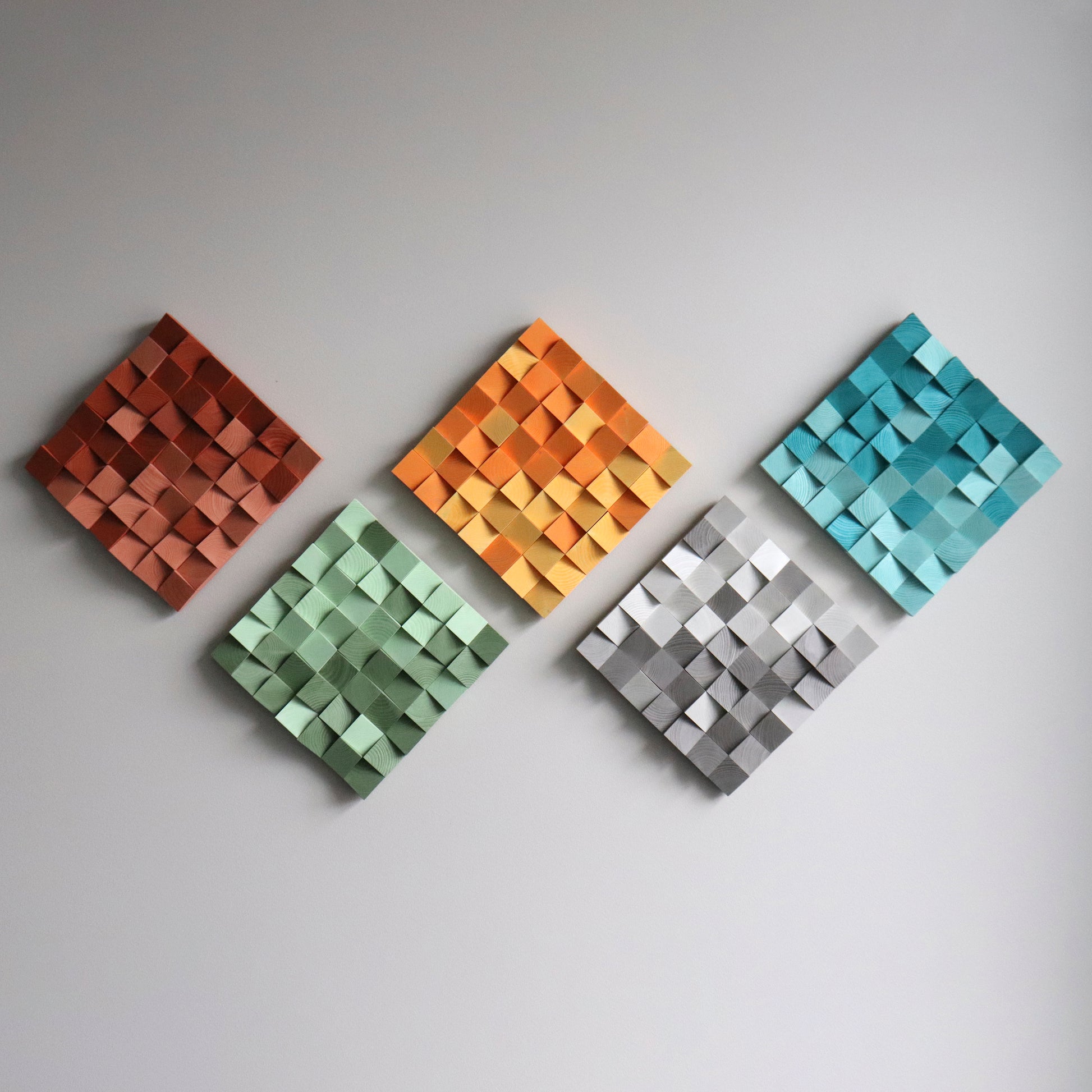 3D wood panel featuring carved geometric shapes and rich texture.