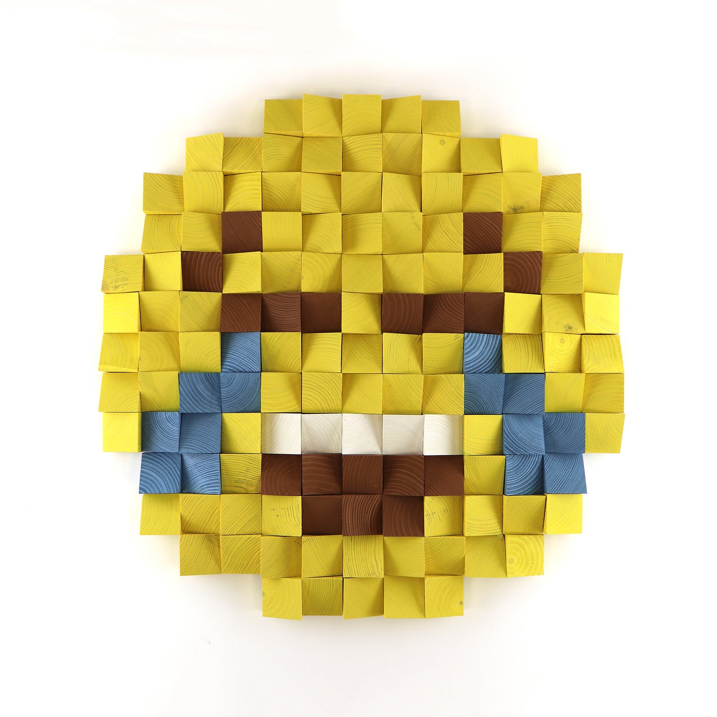 Face with tears of joy emoji 3D wooden wall art featuring blue tear details and layered yellow wooden blocks in a pixel design.
