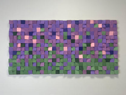 3D wooden wall art with geometric design in shades of lavender, green, and blush pink.