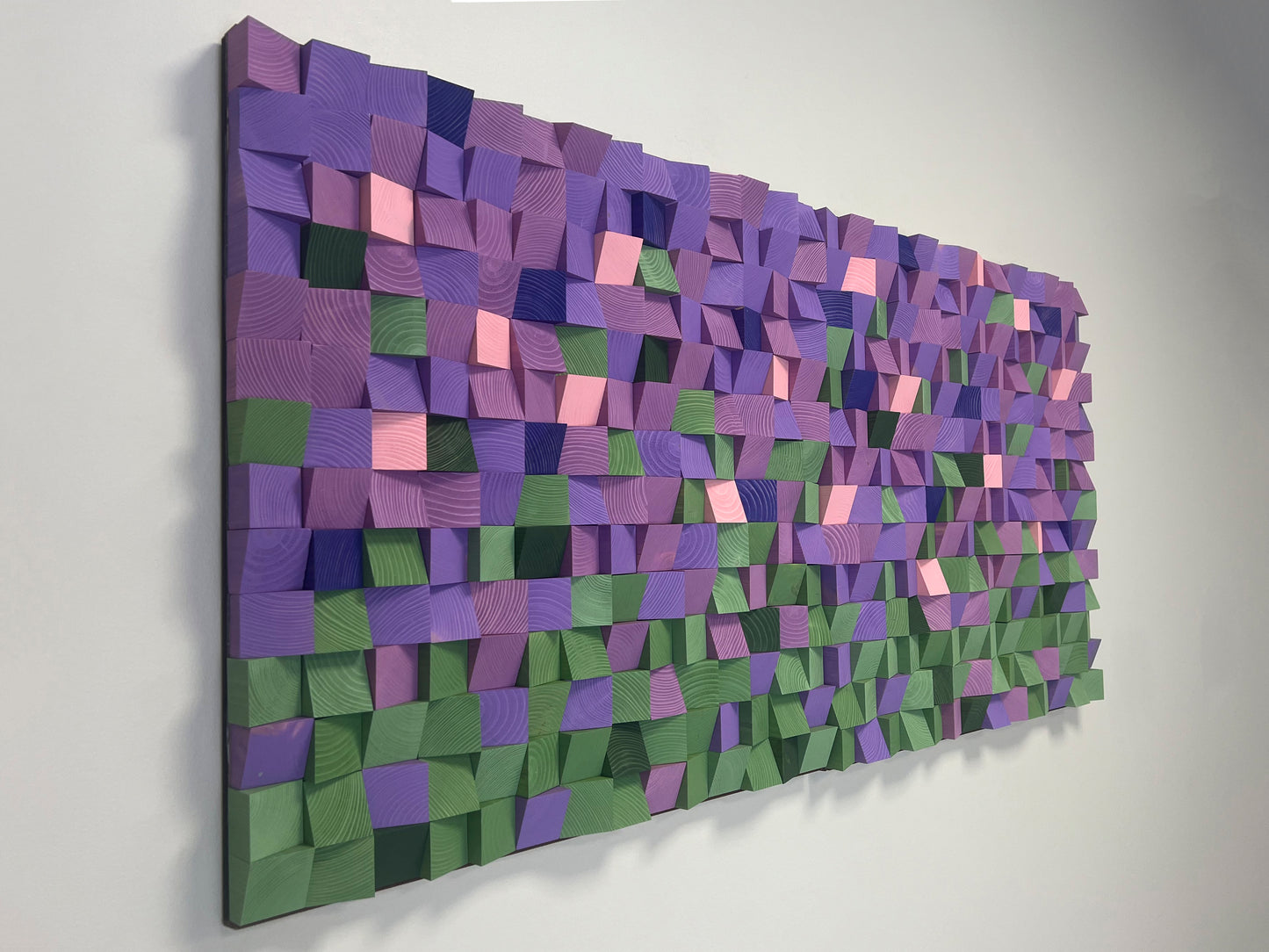 Abstract lavender-themed wood wall panel blending natural wood texture with artistic color gradients.