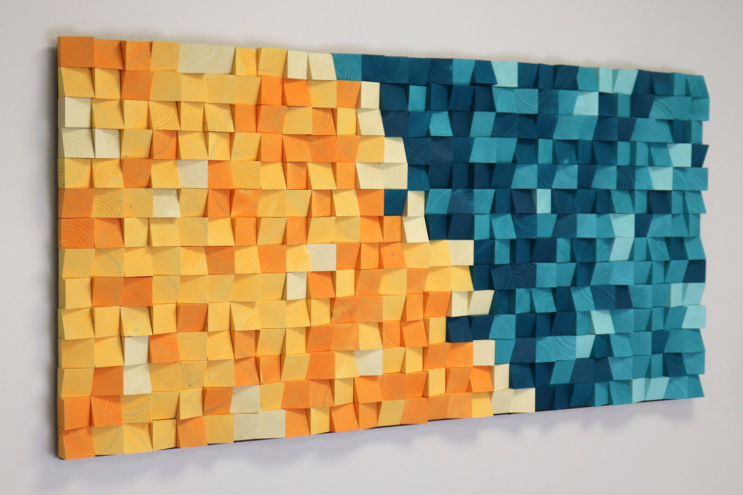 Abstract wooden wall art in gradient yellow and blue hues — perfect accent for living or office spaces.