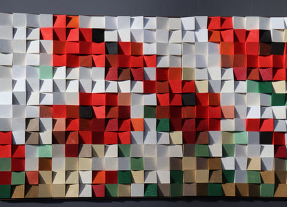 Contemporary wooden wall decoration with sculpted surfaces in warm natural and painted hues.