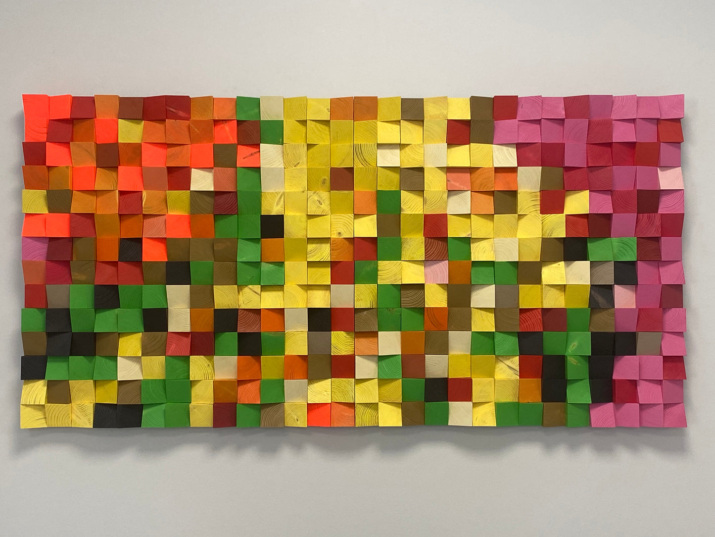 WoodenPix handcrafted acoustic wall decor blending electric colors and natural wood grain for visual depth.