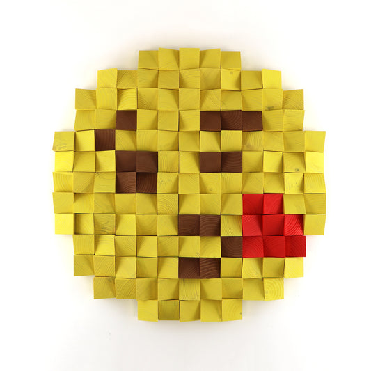 3D wooden emoji kiss face created from colored blocks, showing a detailed pixel-style design.