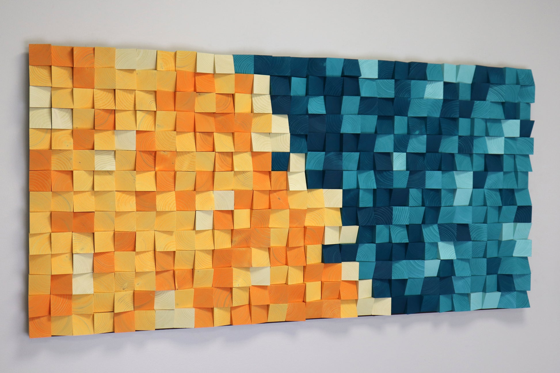 Sunny Lagoon wall art — handmade 3D wood sculpture blending blue and yellow hues for modern interiors.