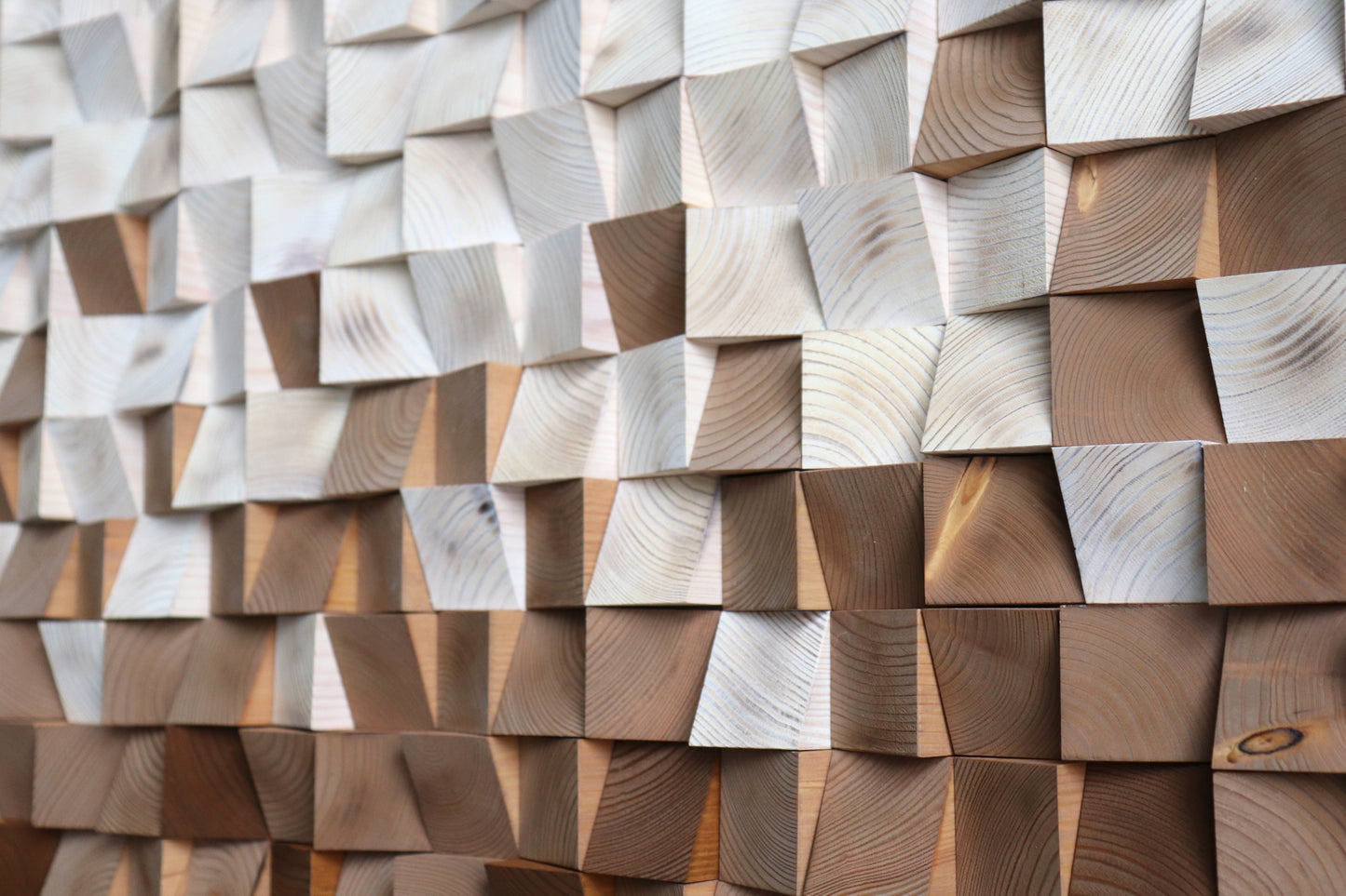 Textured wooden wall panel in mixed cream, walnut, and cocoa shades for modern interiors.