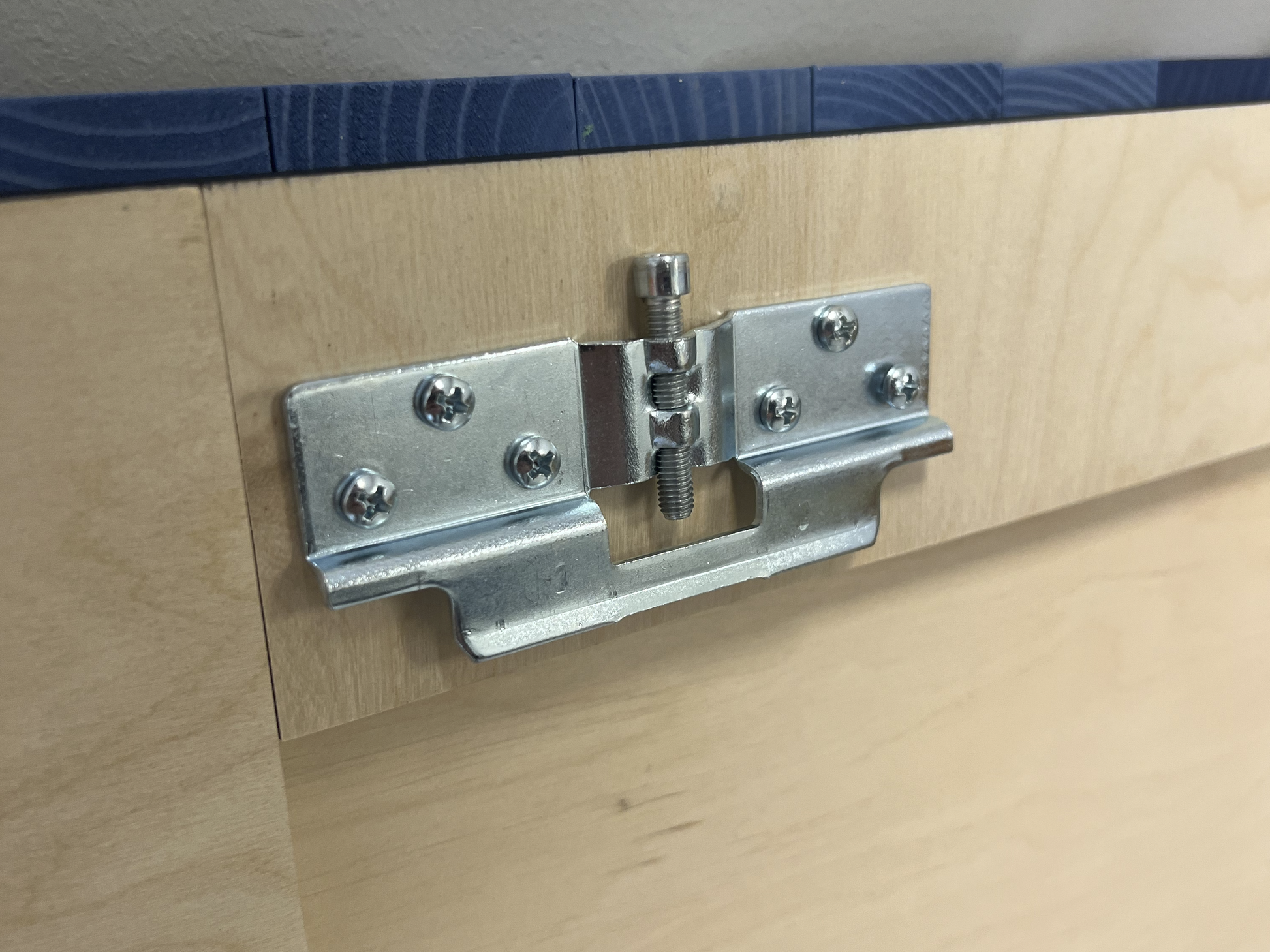 Handcrafted wooden wall panel with pixel-style design inspired by sea and shore harmony.