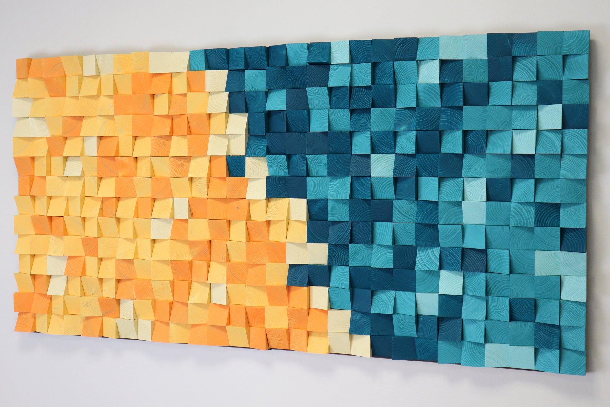 Handmade Sunny Lagoon wall decoration showcasing 3D geometric wood design and vivid color contrast.
