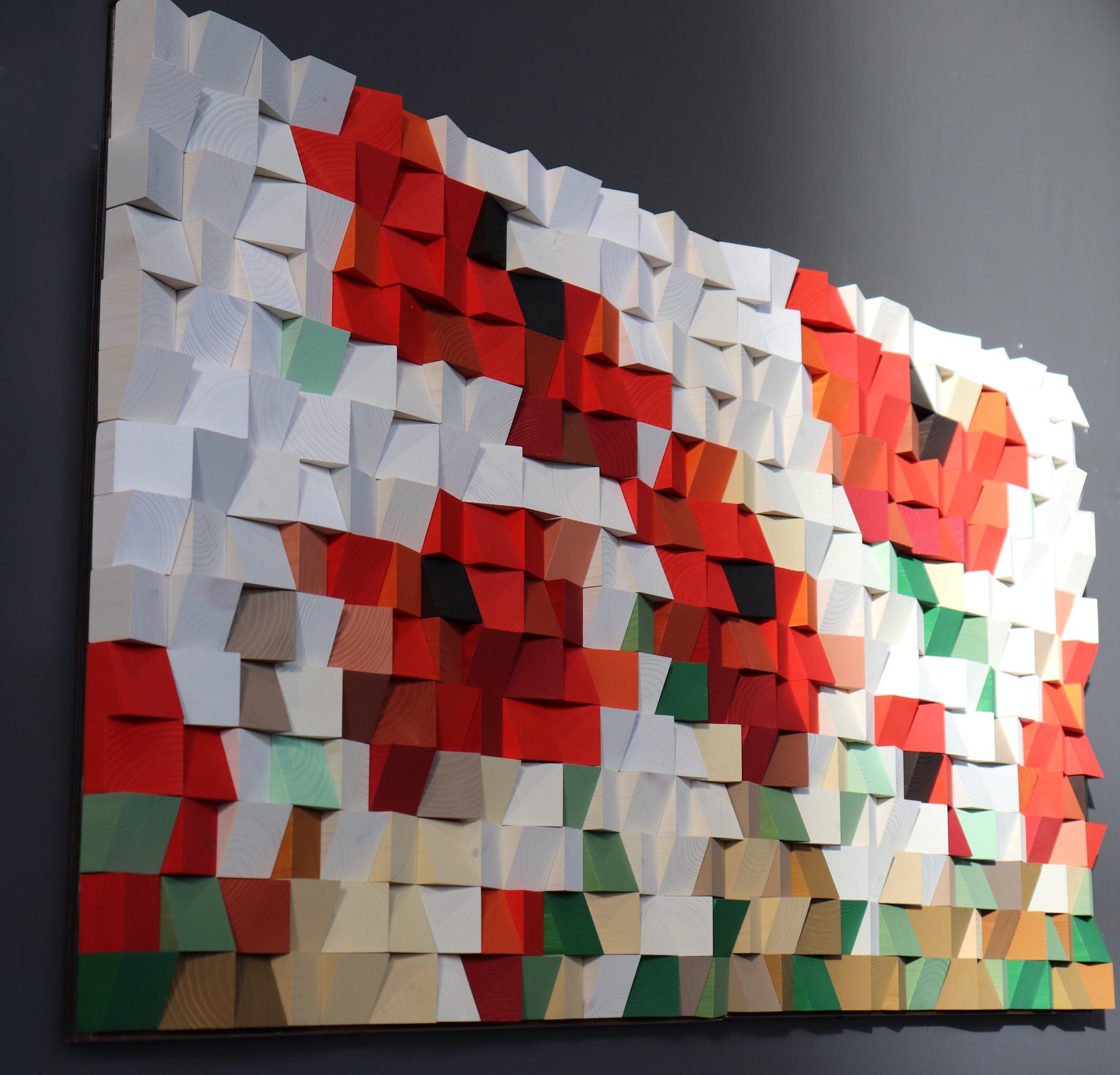 Handmade 3D wooden wall sculpture combining texture, pattern, and color for home or office decor.