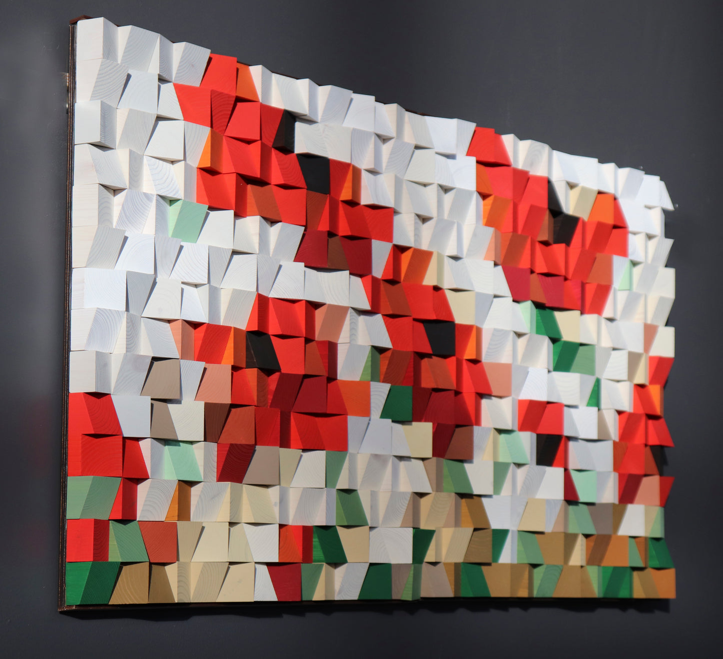 Modern geometric wooden wall decor in red, white, and green tones for contemporary interiors.