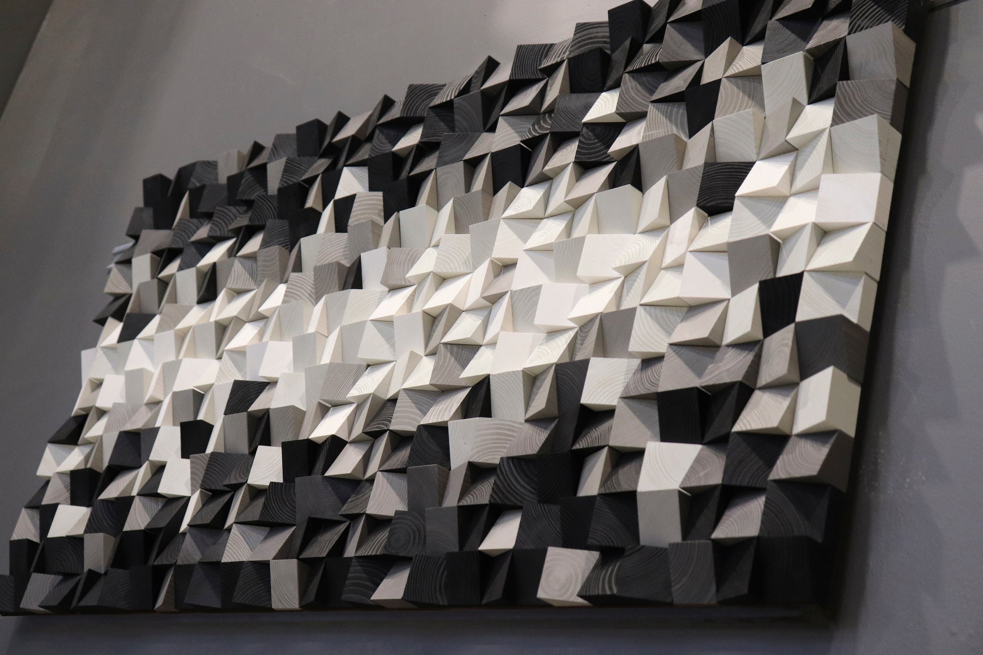 Modern monochrome wooden wall decor in black, grey, and white tones — perfect for minimalist interiors.