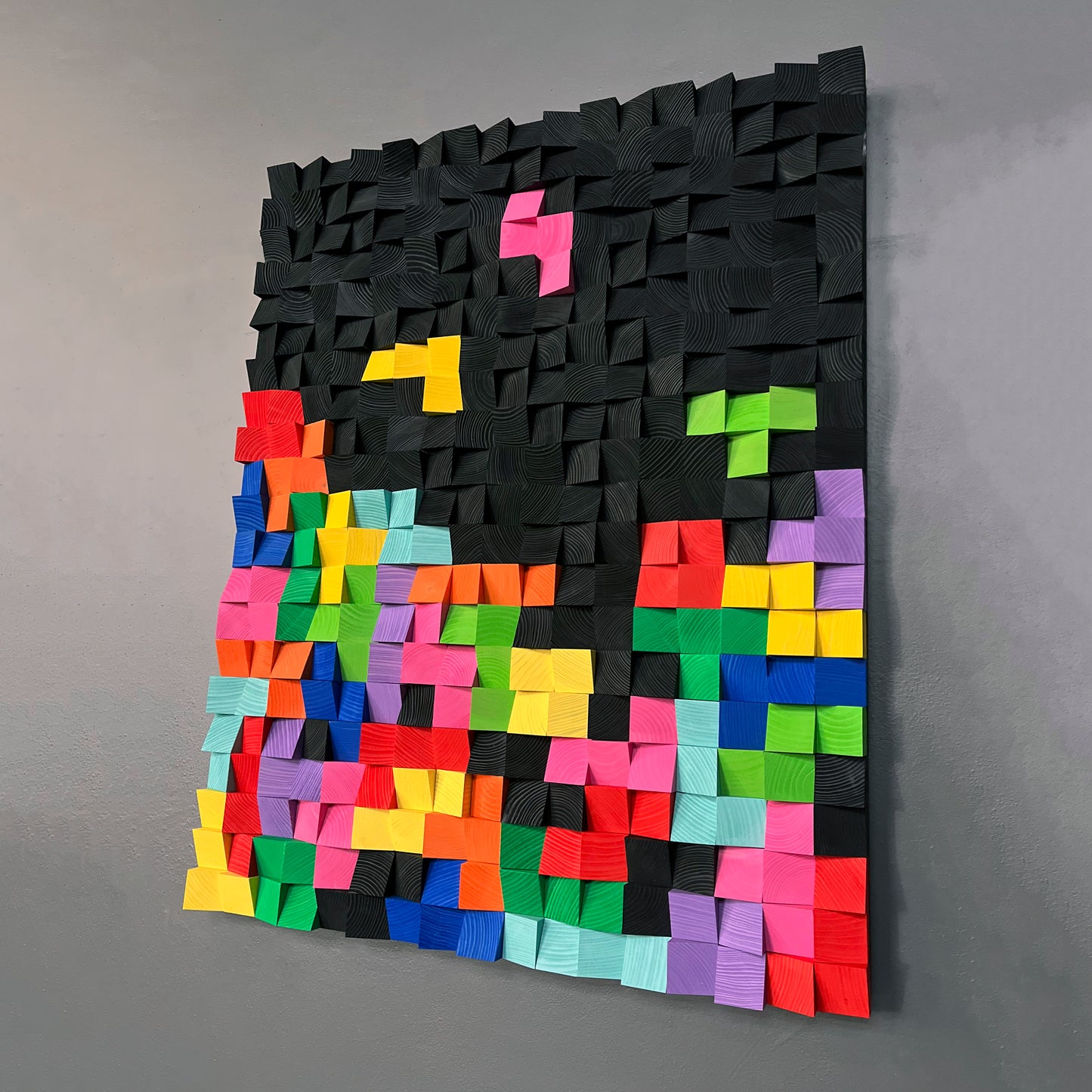 Bold 3D wooden acoustic panel with bright color contrast and textured design.