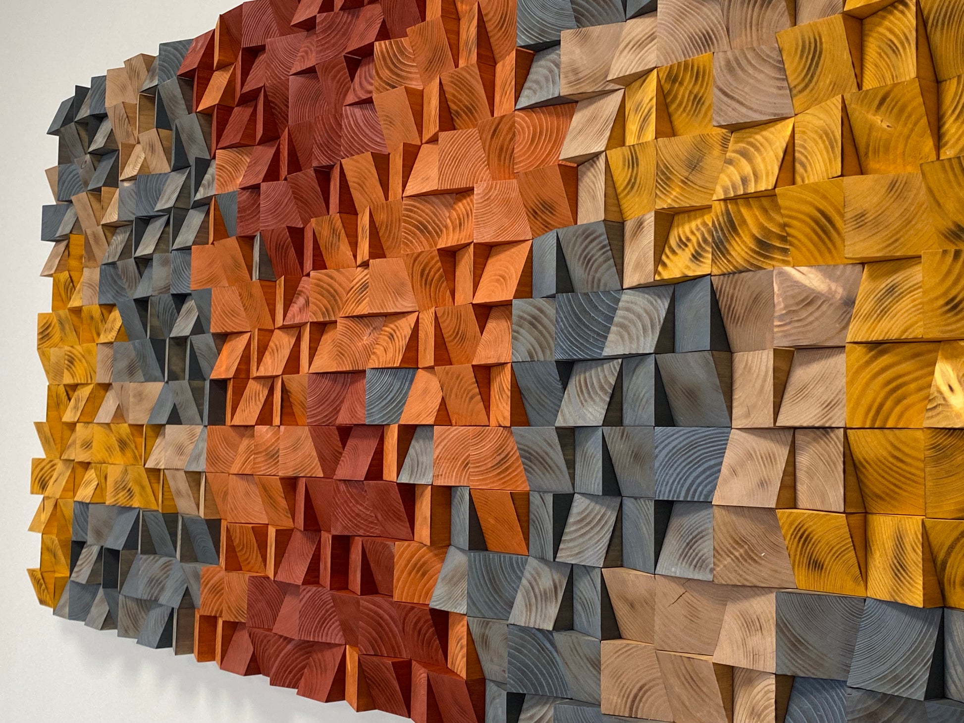 WoodenPix acoustic wall panel crafted from sustainable wood with natural charred texture.