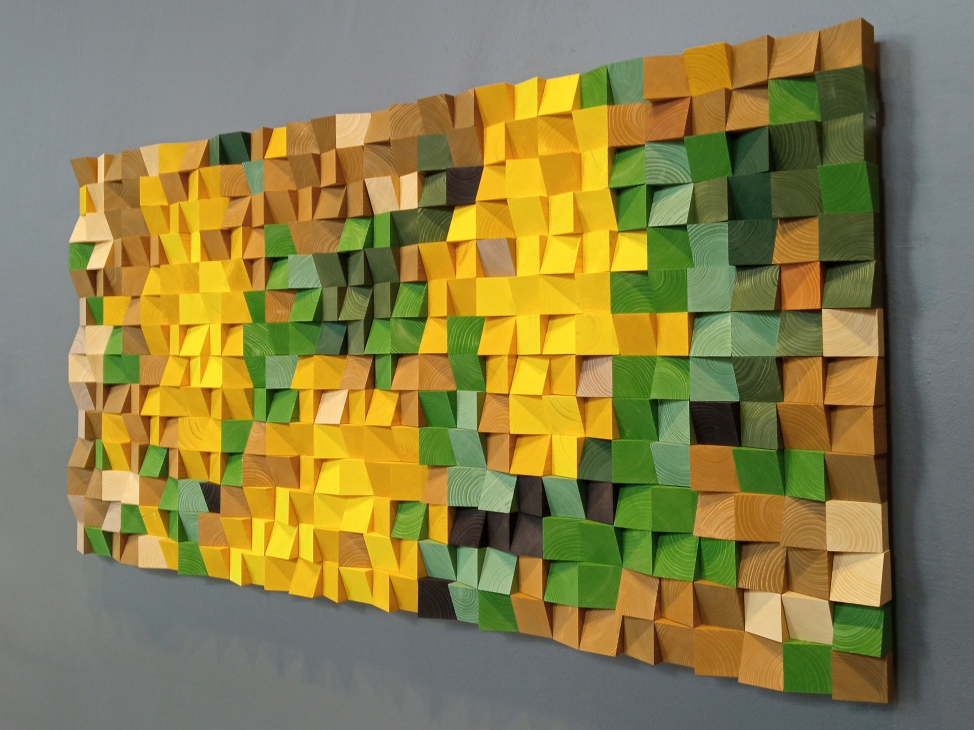 Still Life decorative wood wall panel with rich yellows, greens, and browns for sound diffusion.