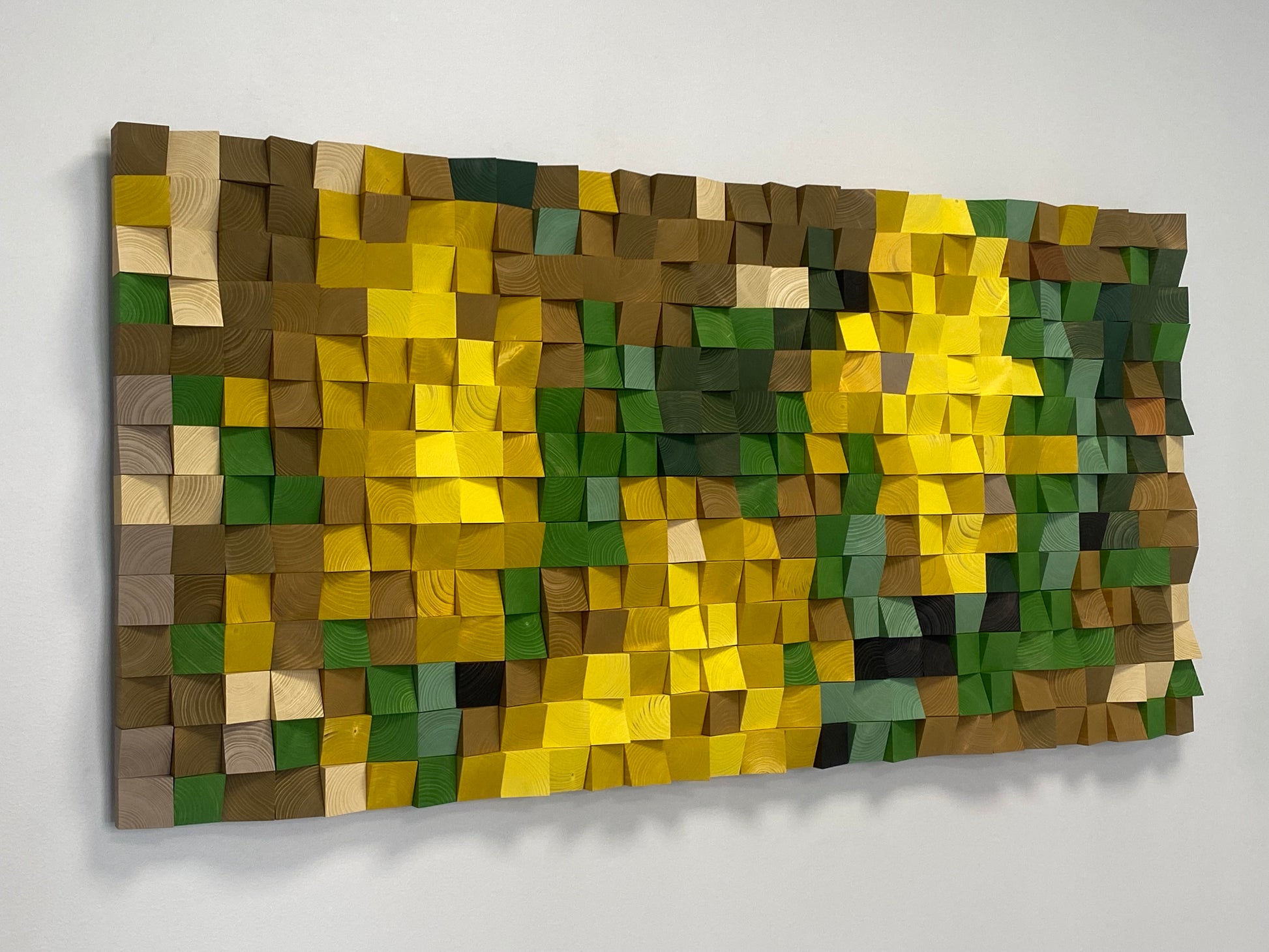 Textured 3D wooden sound diffuser wall decor with an abstract still life pattern.